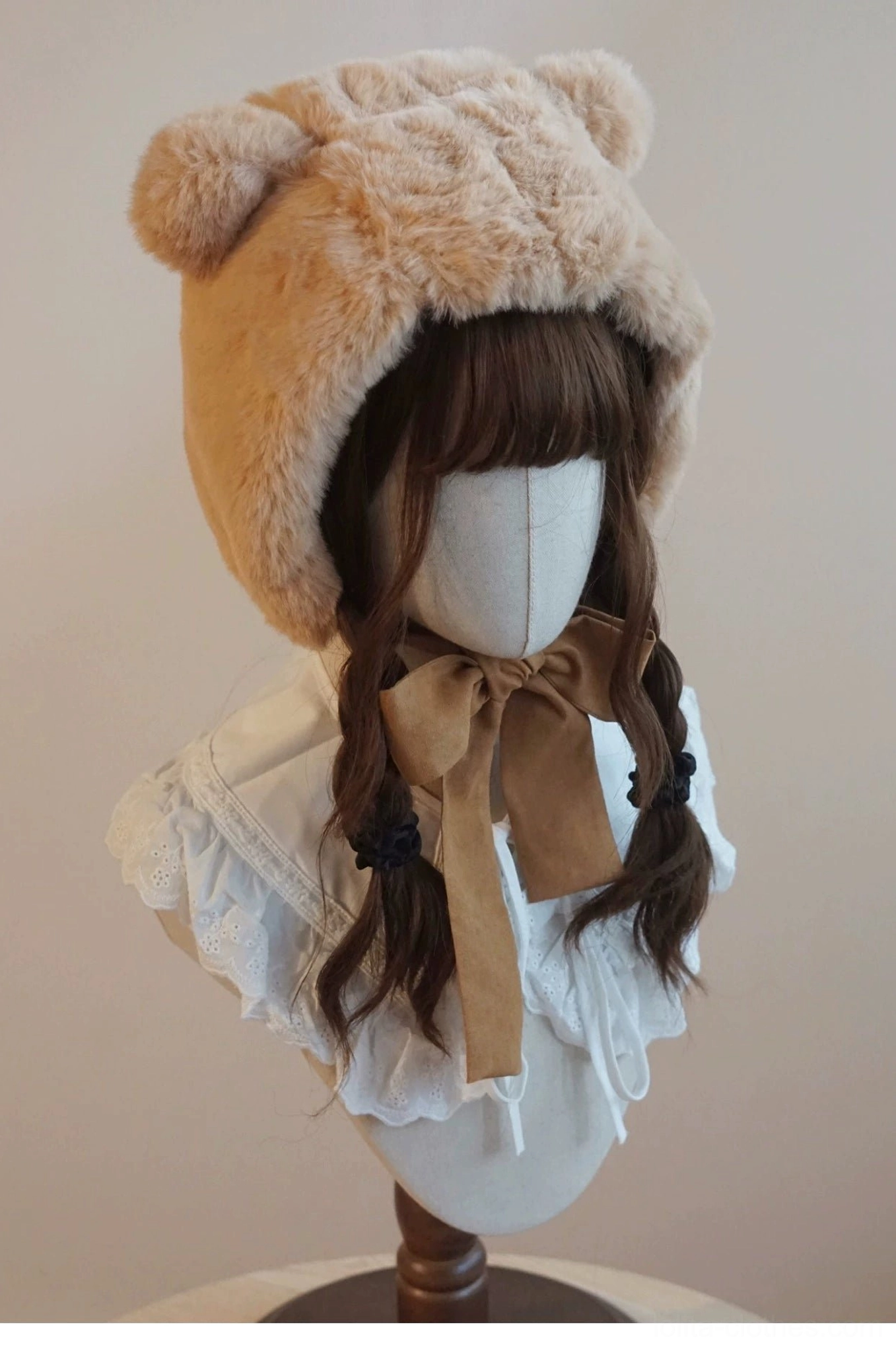Winter lolita bear ear hooded hat detail shot showing plush faux fur texture and dimensional bear ear construction