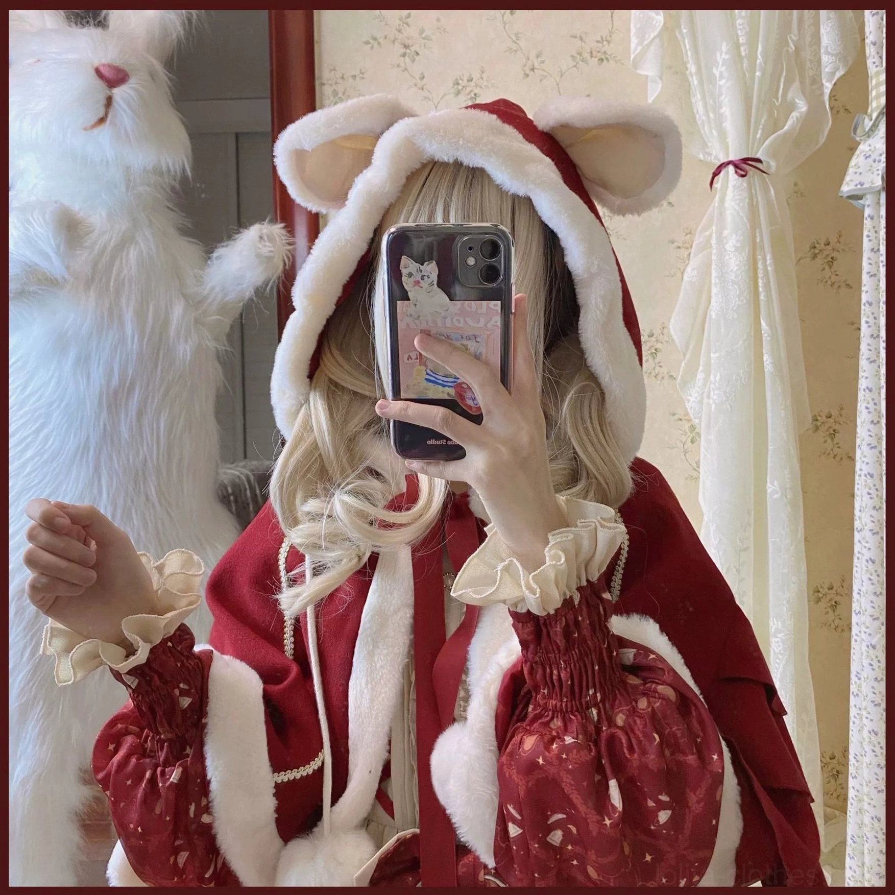Lolita bear ear hooded cape worn on model displaying full hood coverage soft white faux fur trim and tiered shoulder design for festive sweet aesthetic