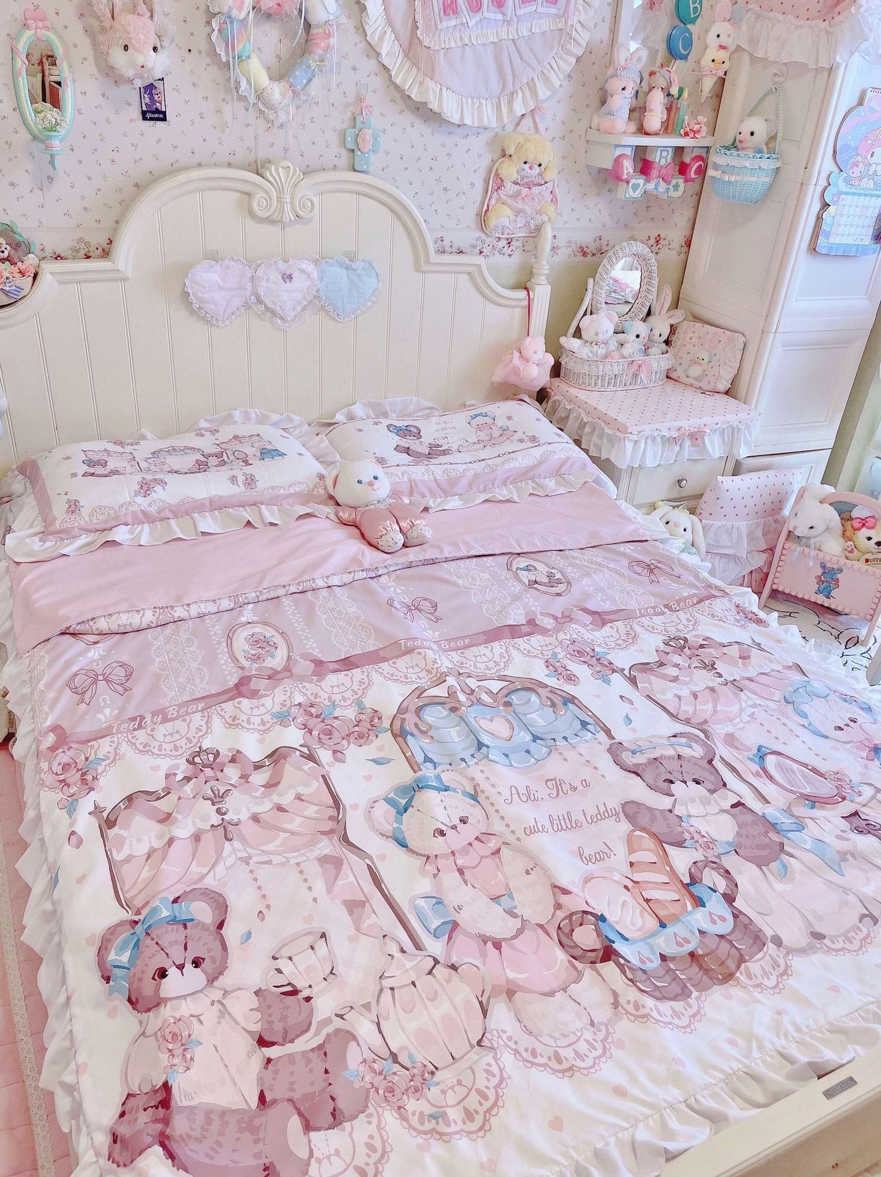 Frontal view of lolita bear print bedding set with heart-shaped headboard, ruffled pillowcases, and central large bear afternoon tea print on cozy princess bed