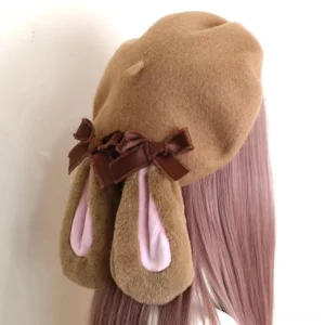 Plush rabbit ear beret back three-quarter view showing dual ribbon bows and soft pink inner ear lining Lolita headpiece