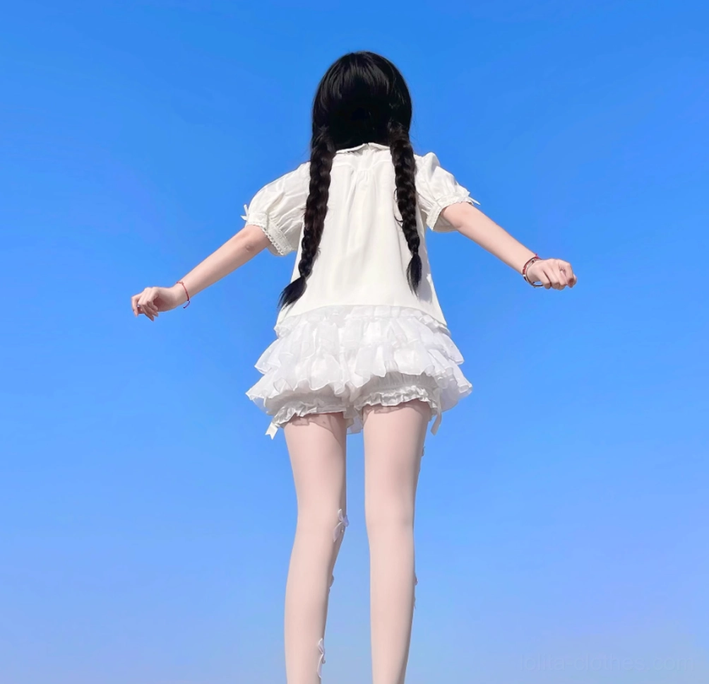 Color comparison showing available lolita bloomers options in white and black with identical ruffled design and finish quality
