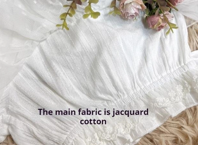 Leg opening detail of lolita bloomers featuring lace ruffled trim with main jacquard cotton construction and soft woven texture