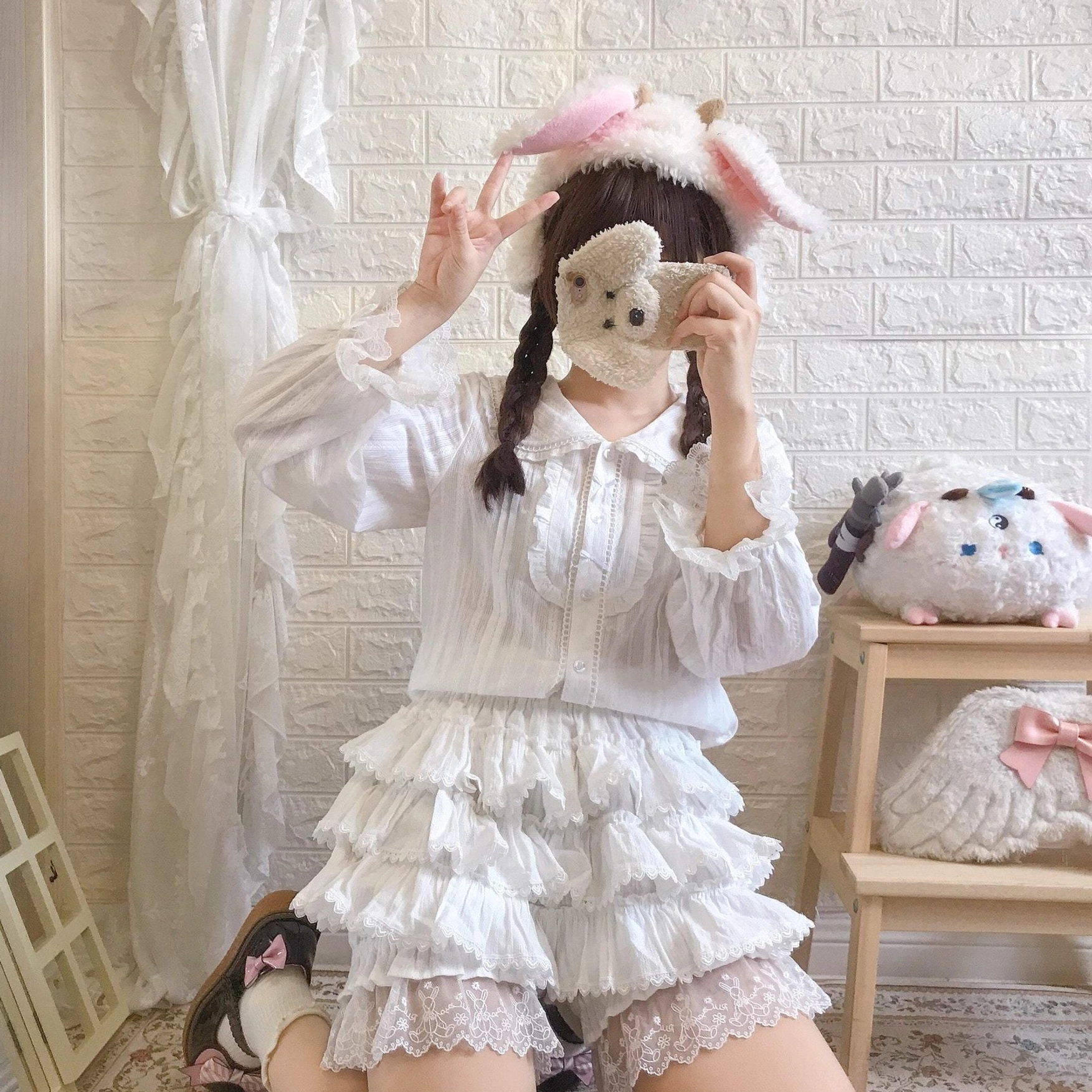 Lolita bloomers size chart comparison showing measurements in centimeters and inches for S and L sizes with waist, hip, leg opening, and length specifications
