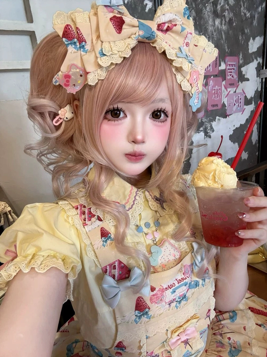 Sweet lolita blouse detailed view showing Peter Pan collar construction lace ruffles puffed sleeve design colorful button closures and premium cotton fabric quality