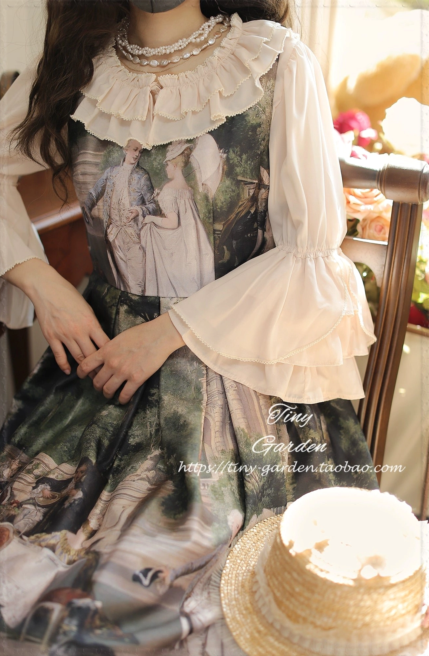Lolita blouse styling coordinate with model wearing white ruffled collar blouse paired with oil painting style vintage lolita skirt, retro table decorations, close-up view of double-layered bell sleeves