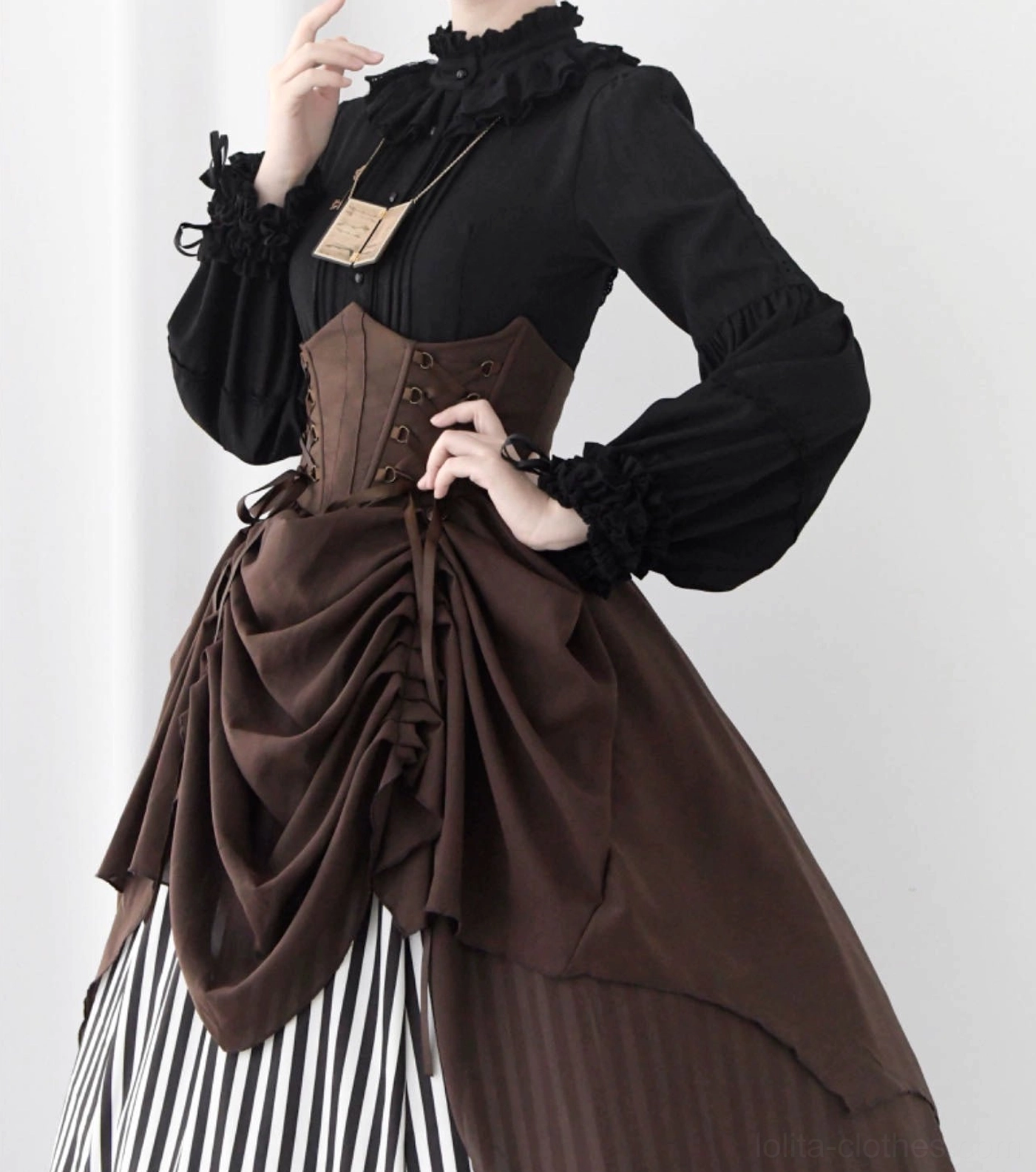 Classic Lolita blouse front button detail showing crystal-effect decorative buttons, front pleated placket, and structured fabric construction for elegant closure system