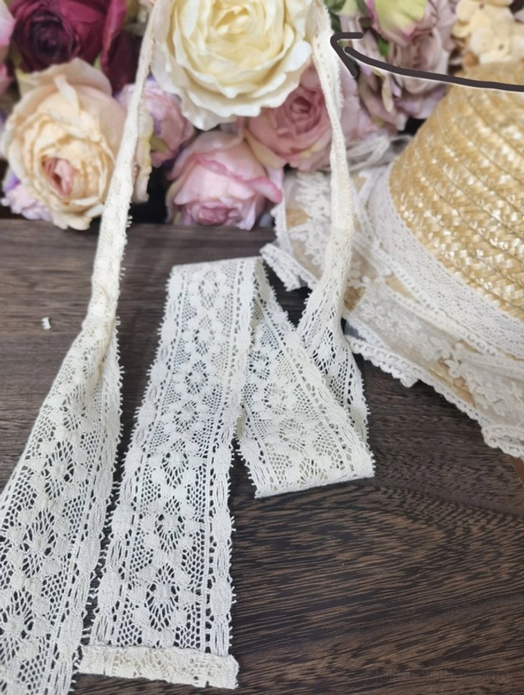 Detailed product photography of Lolita long-sleeve blouse showing fabric texture, construction quality, ruffled embellishments, and fine craftsmanship in the pin-tucks and lace bow tie neckline feature
