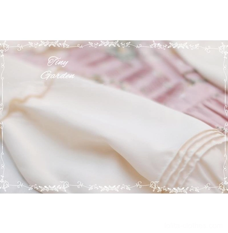 Lolita blouse front placket detail close-up featuring pin-tuck pleats with ruffle trim and neat button front closure on soft fabric