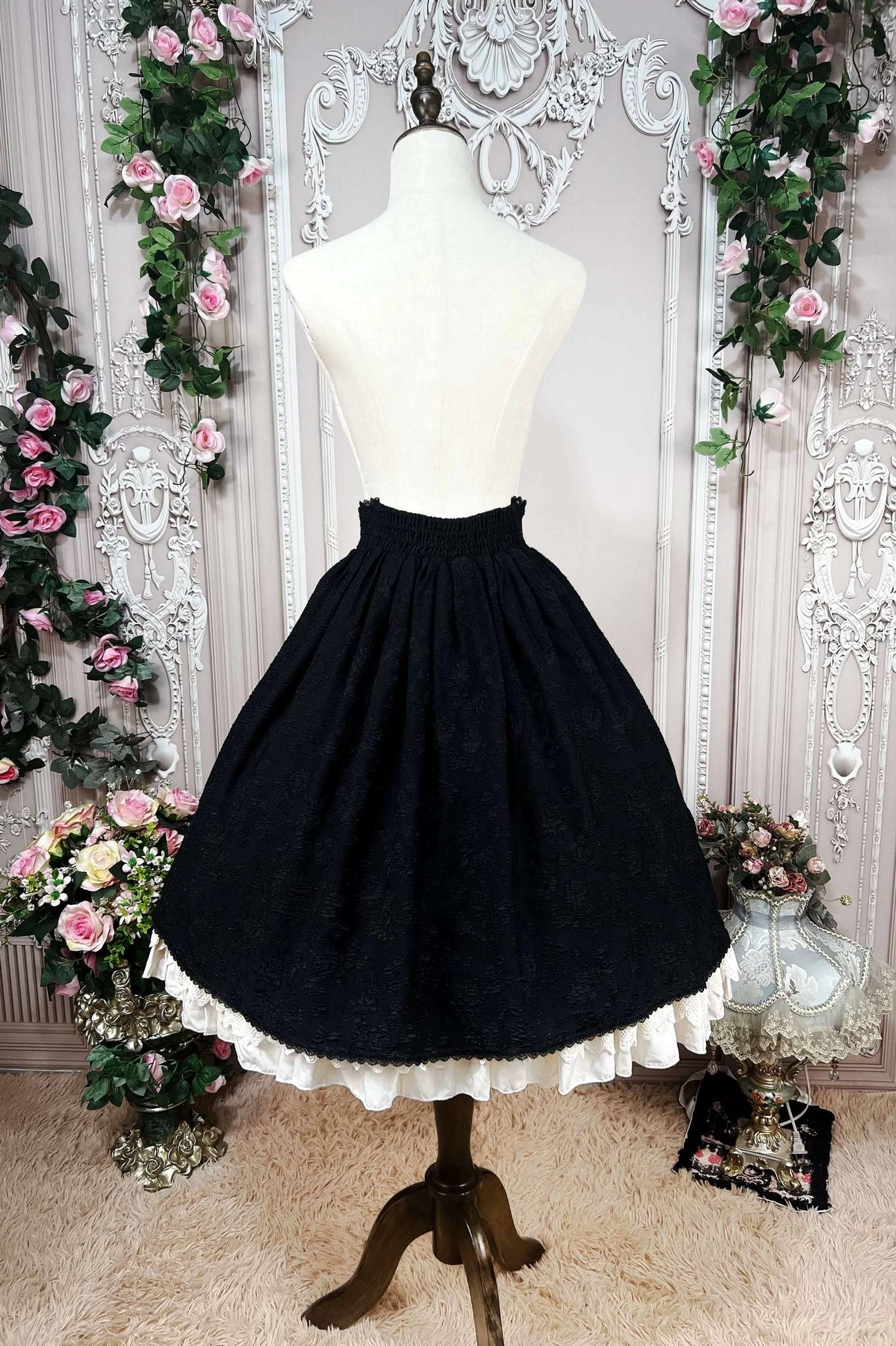 Lolita blouse peter pan collar variation soft cream fabric close-up detail round collar ruffled trim elegant feminine design