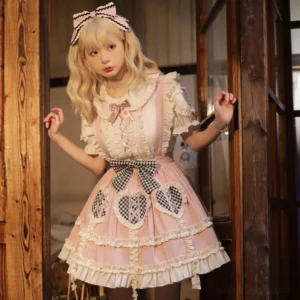 Lolita blouse Peter Pan collar pink bow lace-up front detail three-quarter standing pose