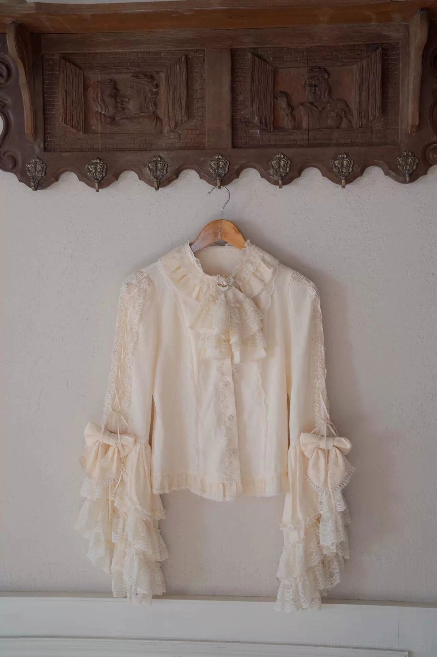 Premium jacquard cotton blend fabric texture close-up of classic lolita blouse showing subtle textured pattern with dimensional weaving and refined detail work