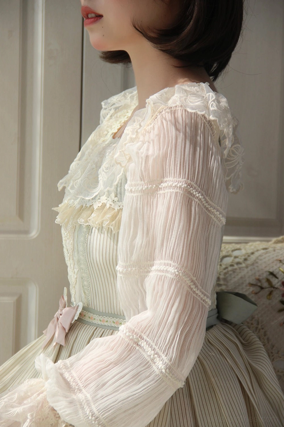 Upper body profile view of Lolita blouse highlighting square collar, lace neckline, and voluminous lantern sleeves
