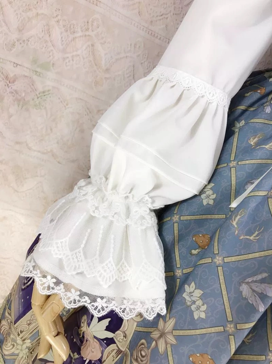 lolita blouse puff sleeve close-up side view gathered lantern sleeve tiered lace ruffle cuff elasticated wrist detail