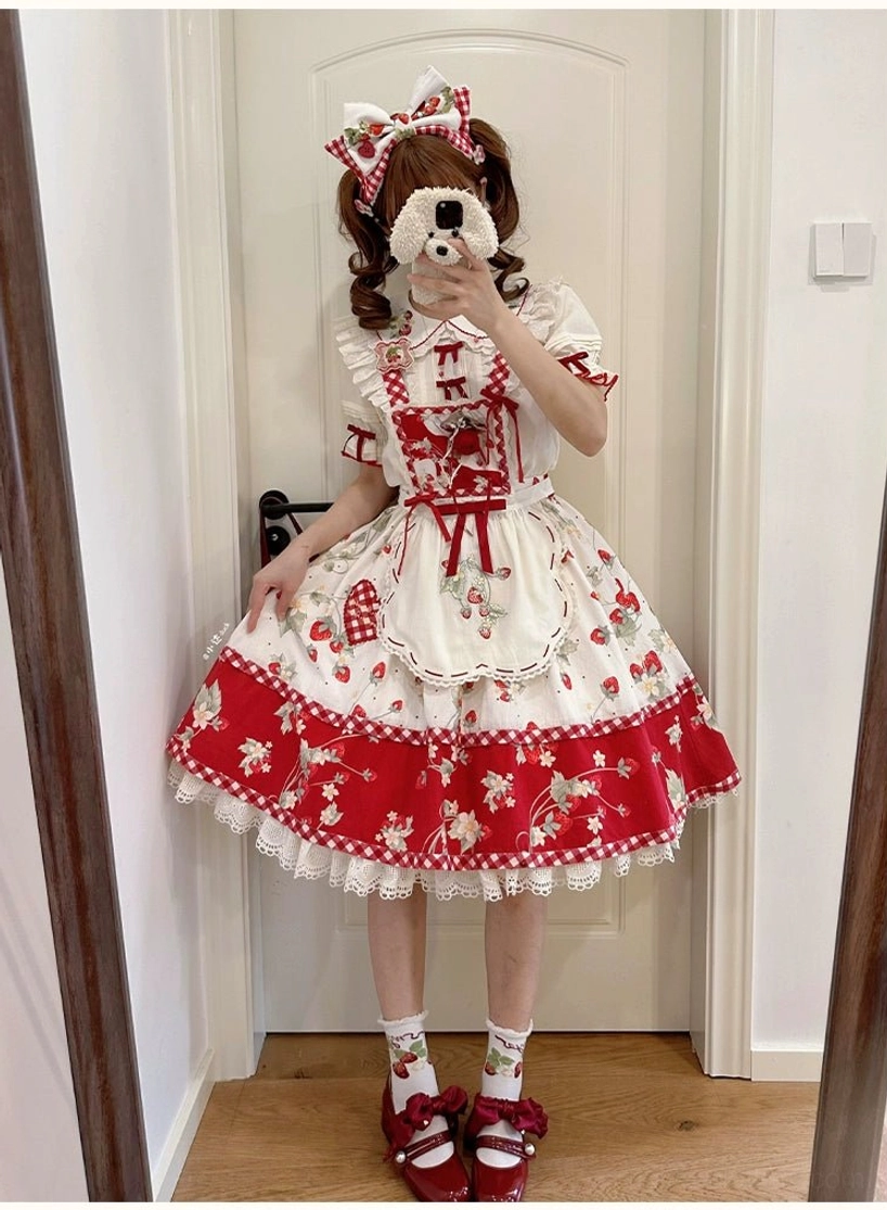 Strawberry embroidered Peter Pan collar lolita blouse sleeve cuff detail showing puffed sleeve construction and red trim finish
