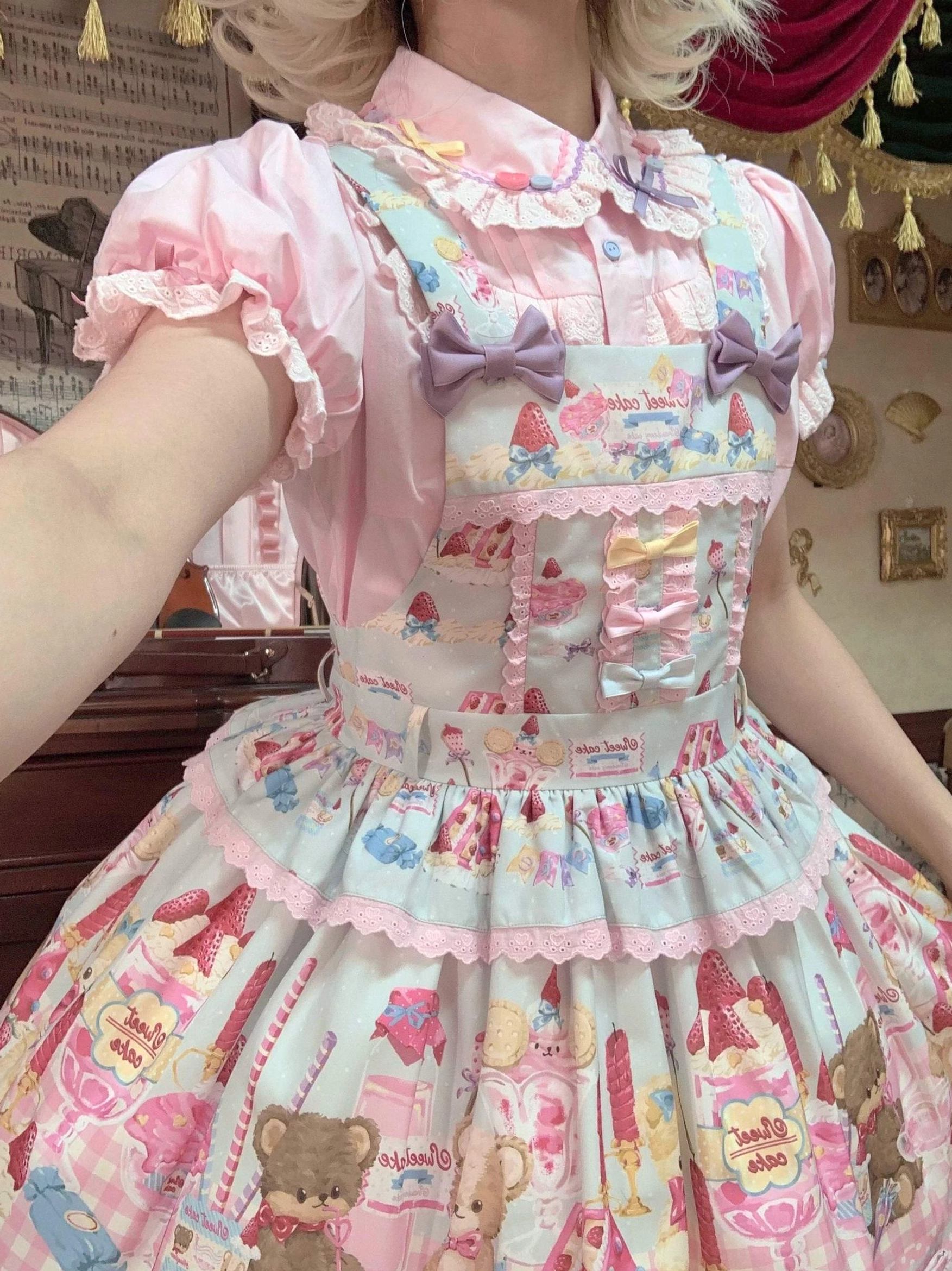 Lolita blouse size chart and measurement guide displaying bust waist shoulder sleeve length across sizes S M L XL in centimeters and inches for proper fitting