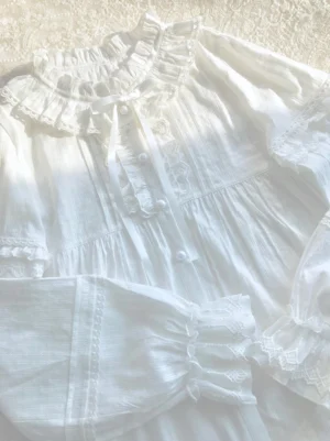 Lolita blouse white cotton frilled stand collar satin ribbon tie pin-tuck bodice lantern sleeves close-up