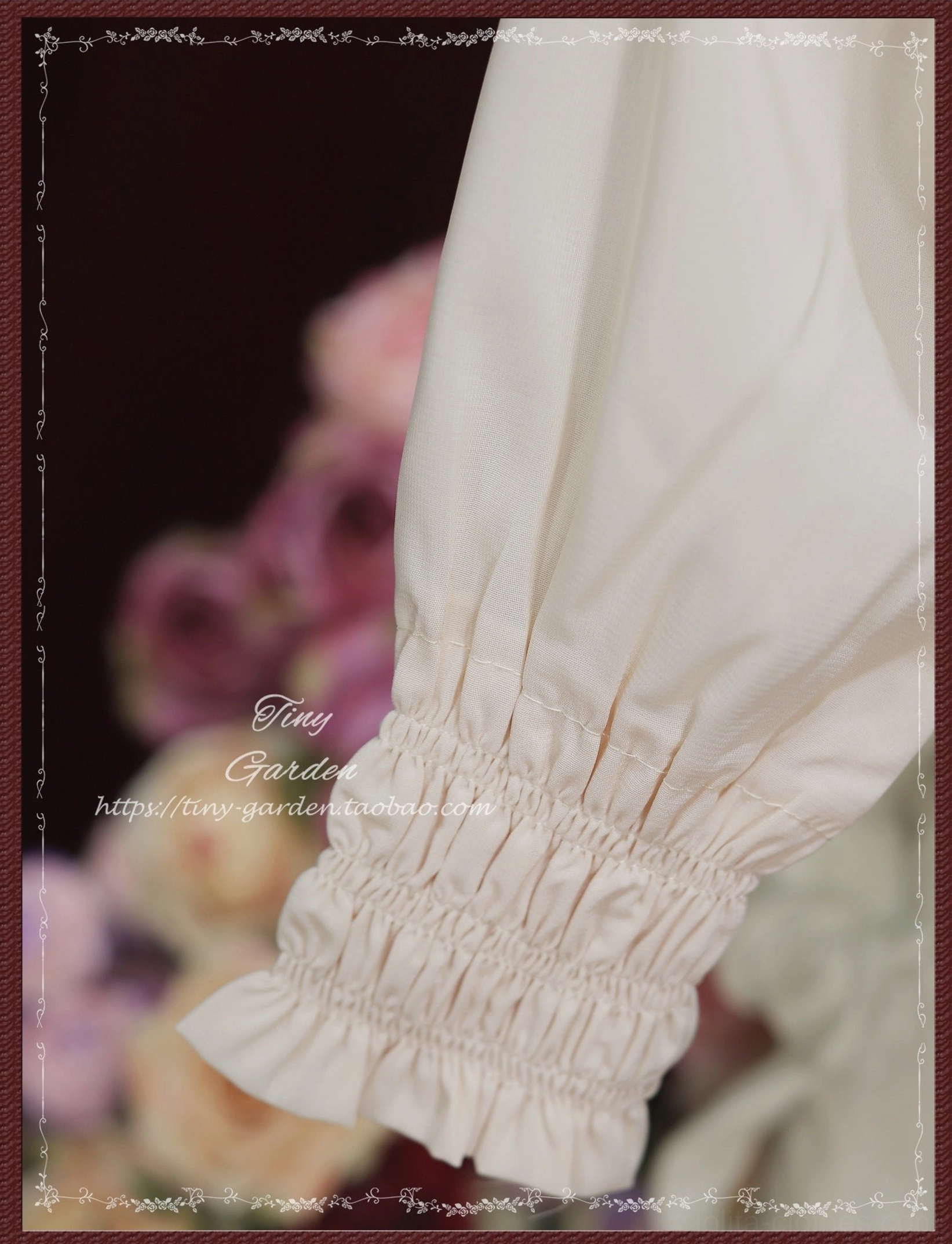 Close-up side view of Lolita blouse wrist section showing shirred elastic cuff, ruffled hem, and soft woven fabric texture against blurry pink flower background