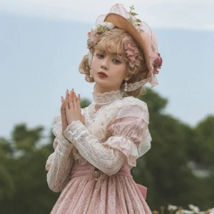 Elegant lolita hat straw boater with fresh flower decorations and satin bow, worn with high-neck lace lolita dress in countryside setting