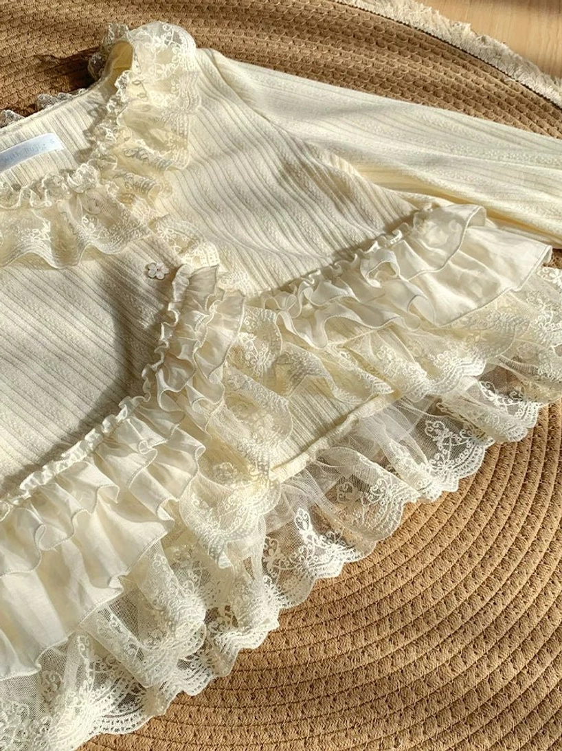 Lolita bolero back view showcasing button closure construction, layered lace trim on upper back, and tailored silhouette for flattering fit