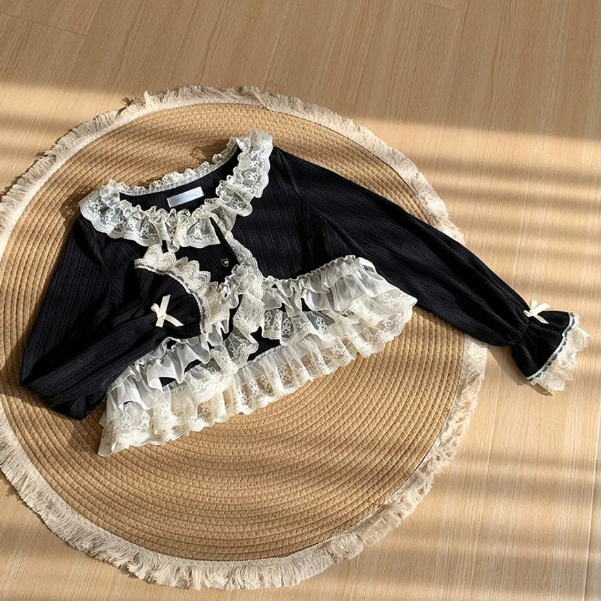 Lightweight polyester knit lolita bolero fabric texture detail showing quality construction and drape suitable for comfortable everyday lolita wear