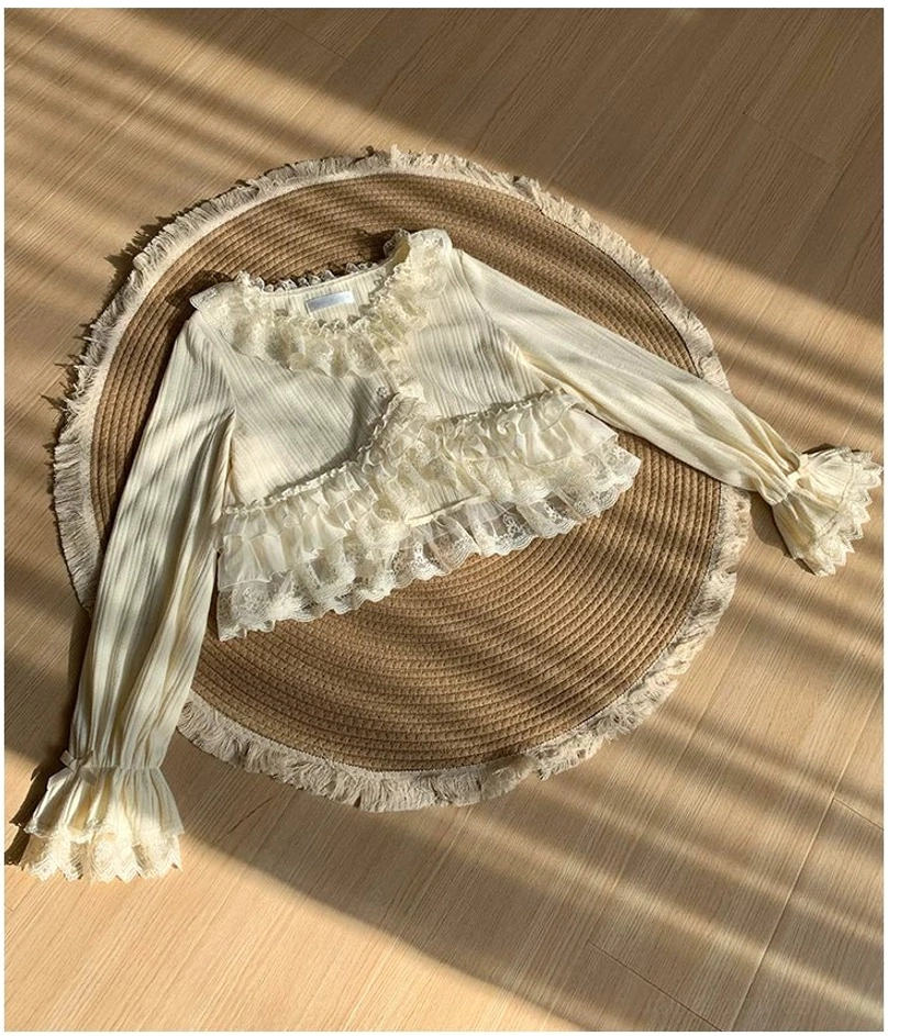 Lolita bolero neckline detail exhibiting V-neck design with layered lace ruffle trim, elegant construction for refined lolita aesthetic