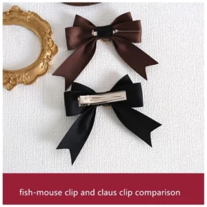 Comparison of fish-mouth clip and prong brooch clip styles for lolita hair accessories with gold heart-wing decorations