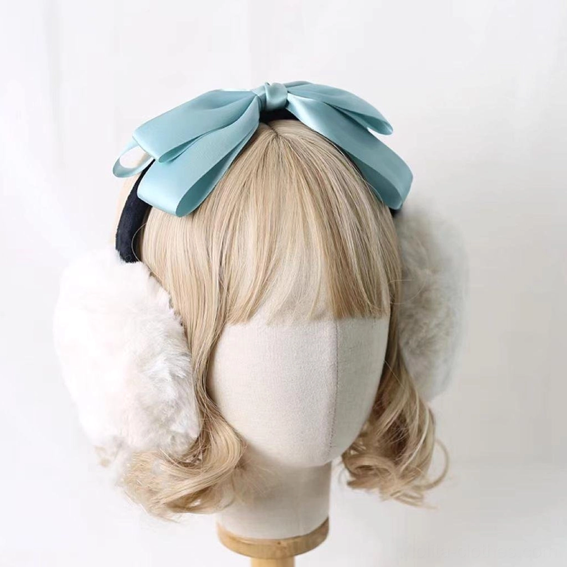 Lolita elegant blue bow earmuff headdress on blonde mannequin, mint green aqua satin bow, white plush earmuff design, winter lolita accessories