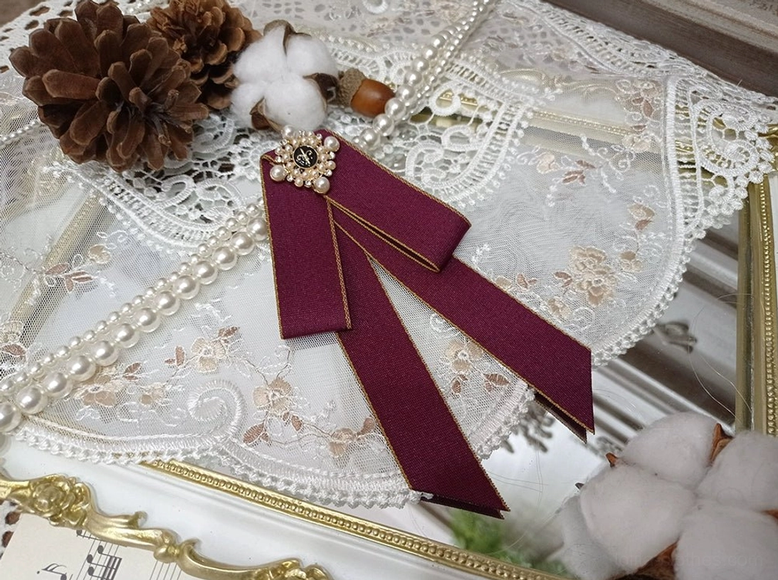 elegant-lolita-ribbon-bow-brooch-pearl-flower-ornament-vintage-gilt-frame-styling-luxury-accessory-detail-close-up