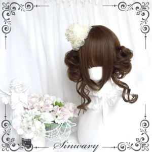 Kawaii Lolita brown twin bun wig with blunt bangs and cream flower hair clip displayed on mannequin with white floral backdrop and angel decor - front three-quarter view