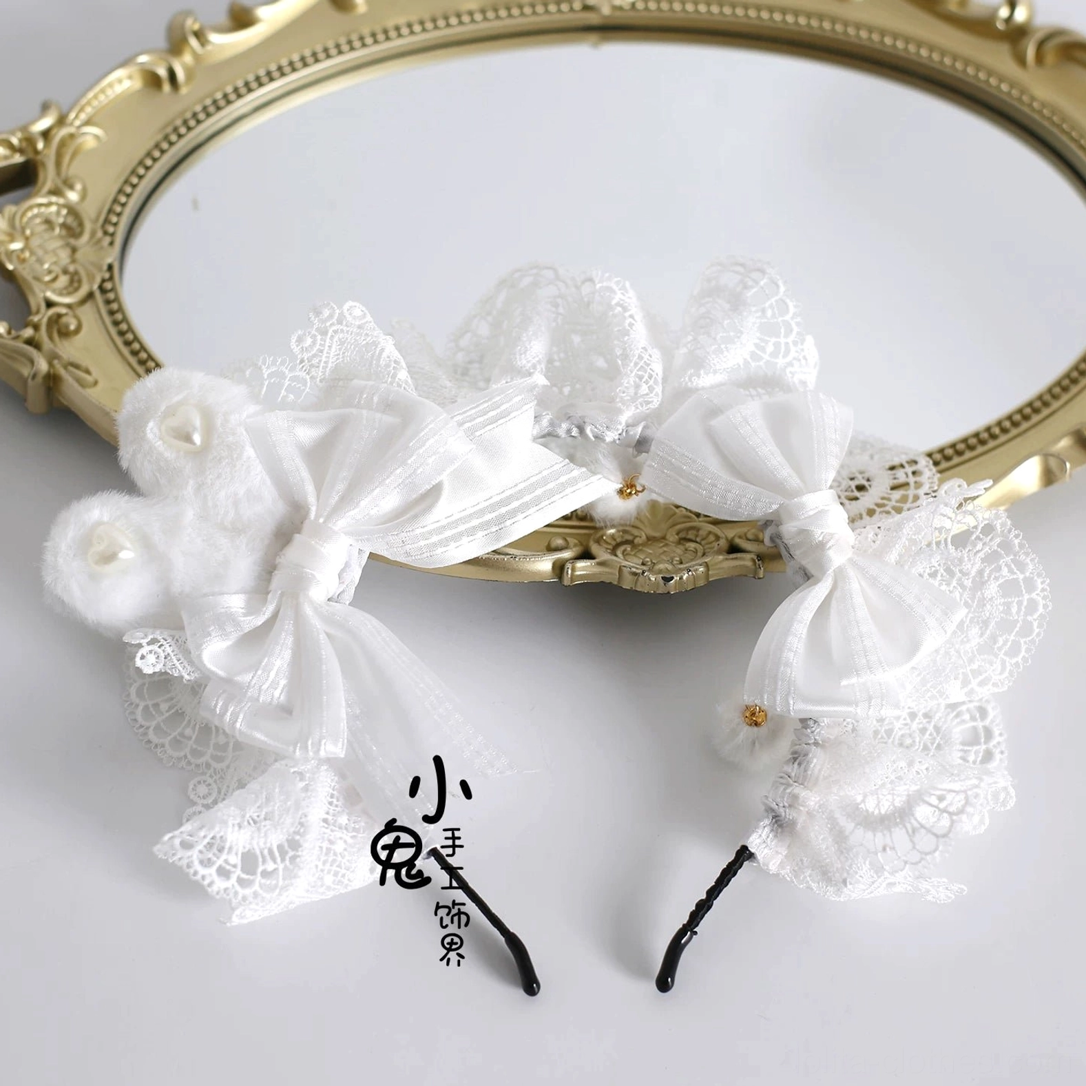 Pair of Lolita bunny ear KC hair ornament clips with white satin lace bows, fluffy pom-pom embellishments and delicate ribbon tails