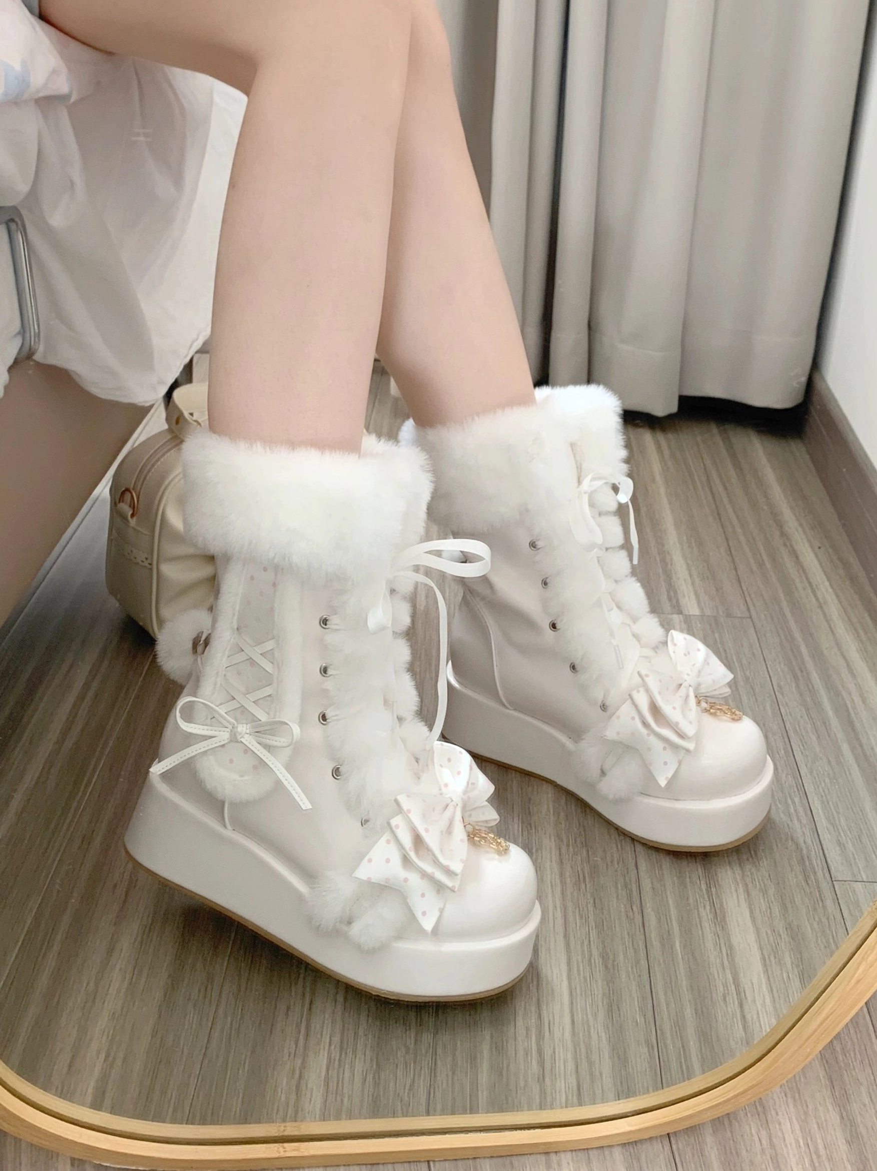 Sweet lolita bunny ear platform boots worn as part of complete lolita coordinate, demonstrating styling integration with lolita skirts, blouses, and themed accessories for authentic fashion expression