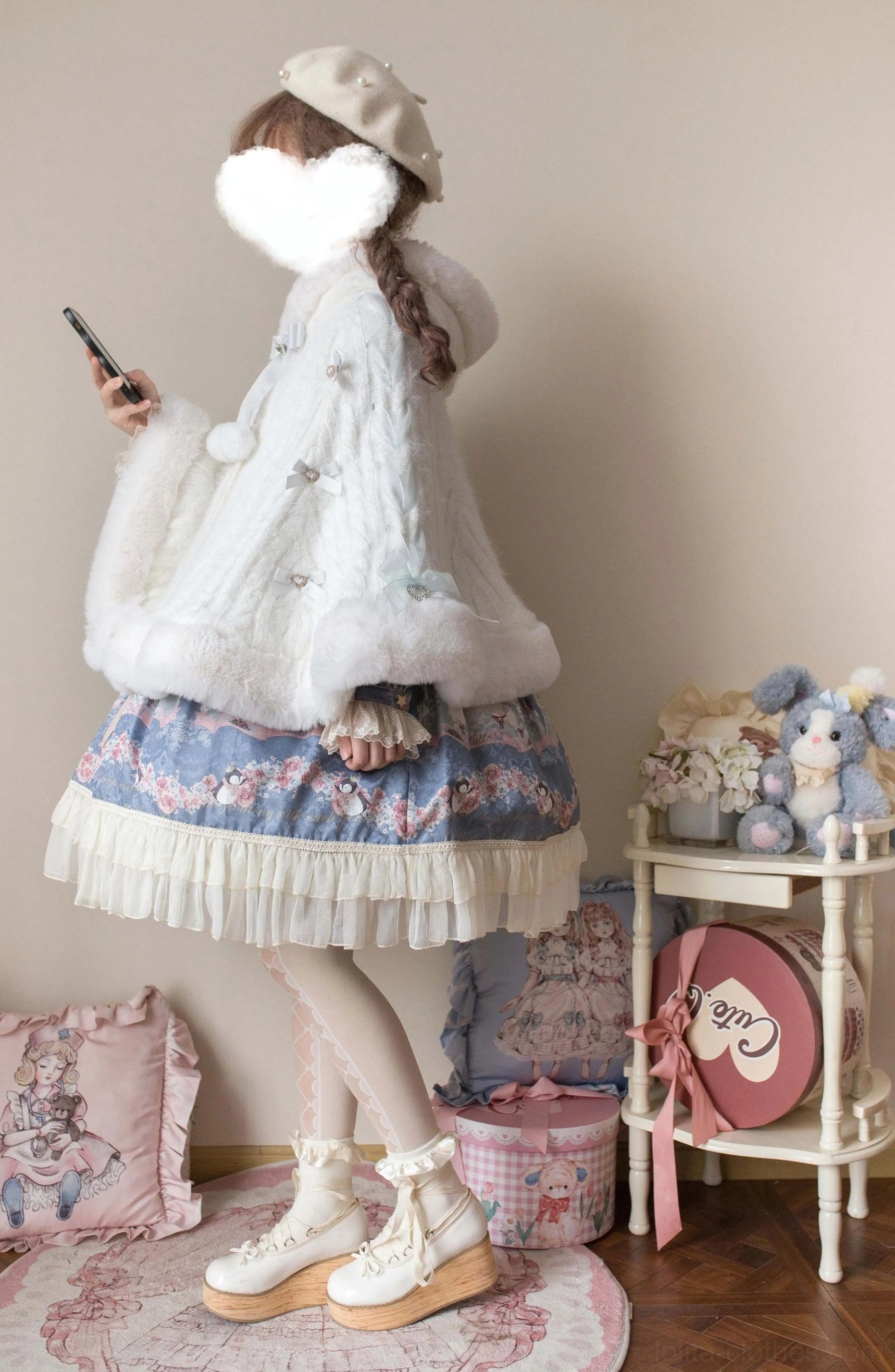 Lolita winter cape coat construction details showcasing acrylic blend fabric, heart-shaped buttons, plush interior lining, and decorative pom-pom elements
