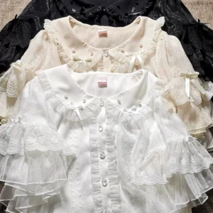 Three-piece Sweet Lolita chiffon blouse collection showing beige and white front pieces with black blouse background, sheer shimmer chiffon fabric, crystal-like round buttons, and ruffled pearl-decorated collar details