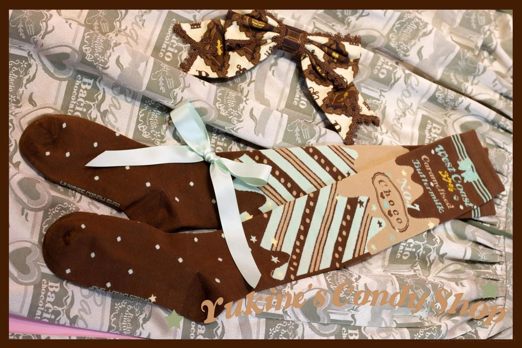Chocolate lolita socks with light blue satin ribbon tie side view featuring striped print and chocolate bow accessory