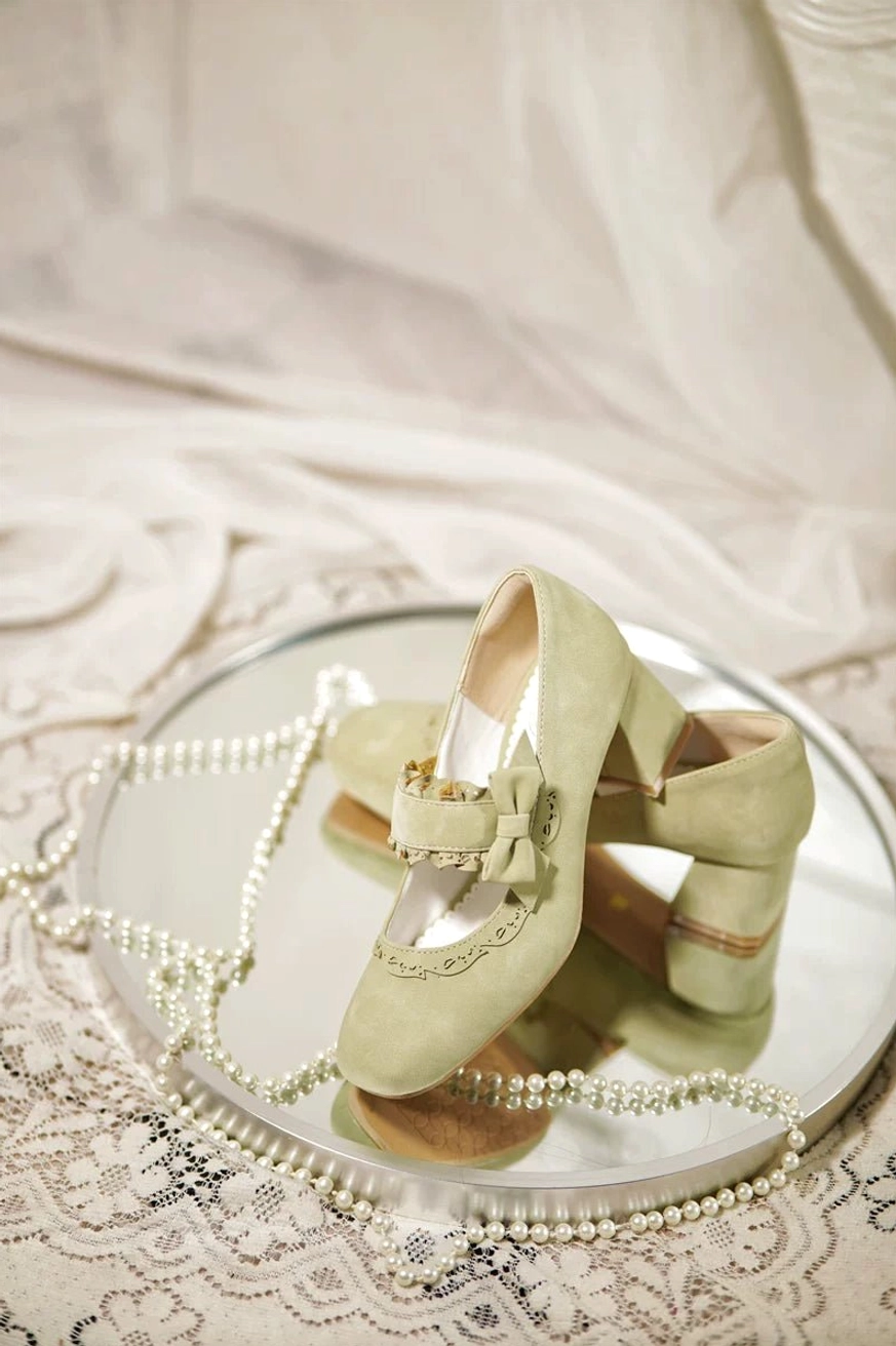 Classic lolita chunky heel mary jane shoes in various colorways including haze blue and cream apricot, arranged display showing multiple color options and design variations of the cutout trim heels