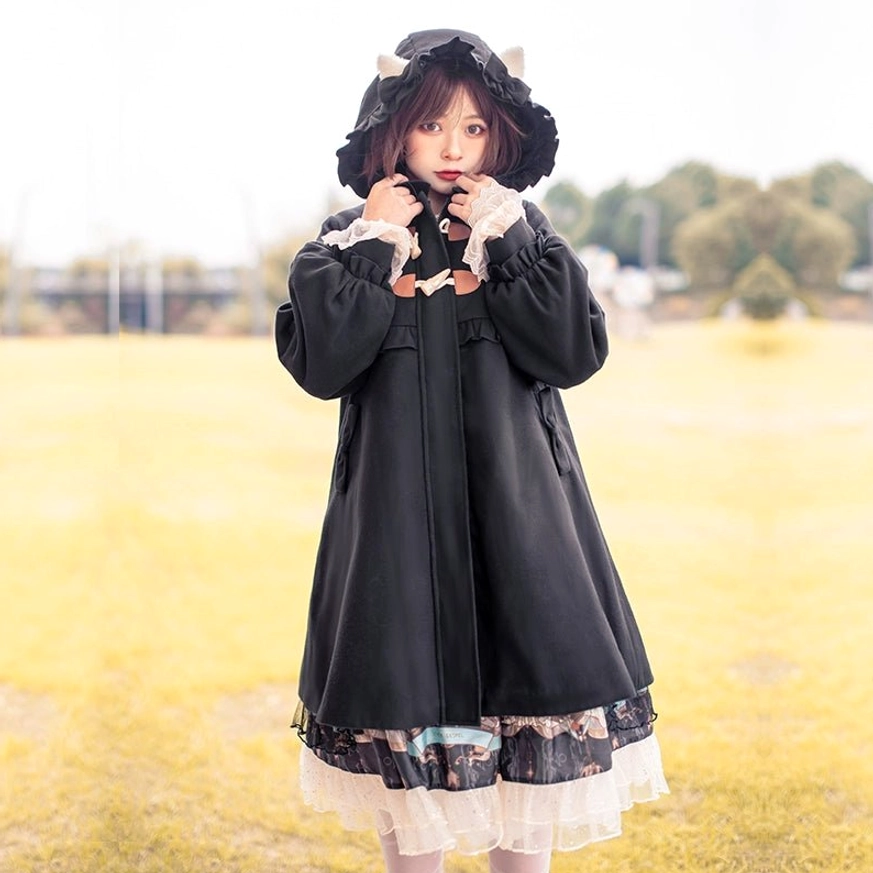Lolita coat burgundy color variant three quarter view model posing urban setting ruffled embellishments cat ear hood