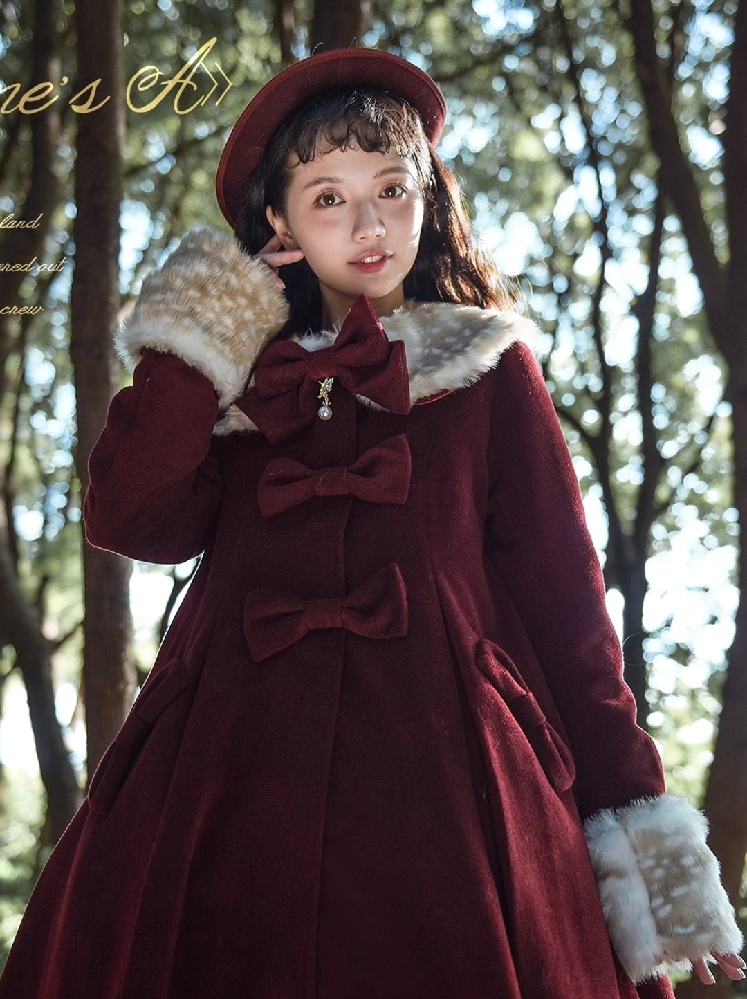 Close-up detail burgundy lolita coat front chest bows with jewel pendant faux fur collar and mittens outdoor woodland