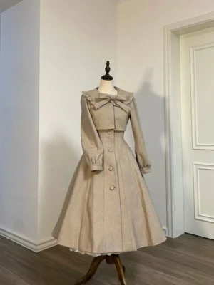 Complete mannequin display of khaki lolita woolen coat suit featuring bow-decorated collar, single-breasted front closure, elegant A-line flared midi skirt, and refined long sleeves in minimalist corridor background