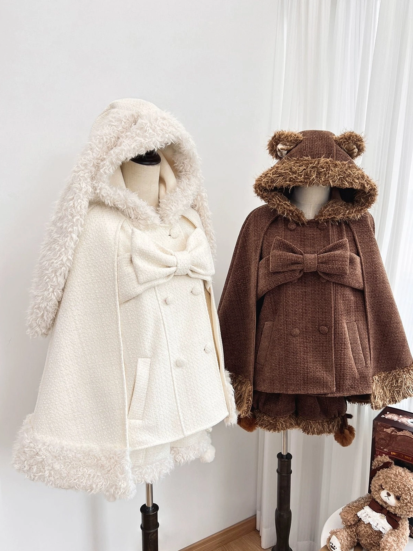 Lolita community styling reference showing authentic color coordination and accessories pairing for tea party meetups and fashion conventions with rabbit and bear themed capes