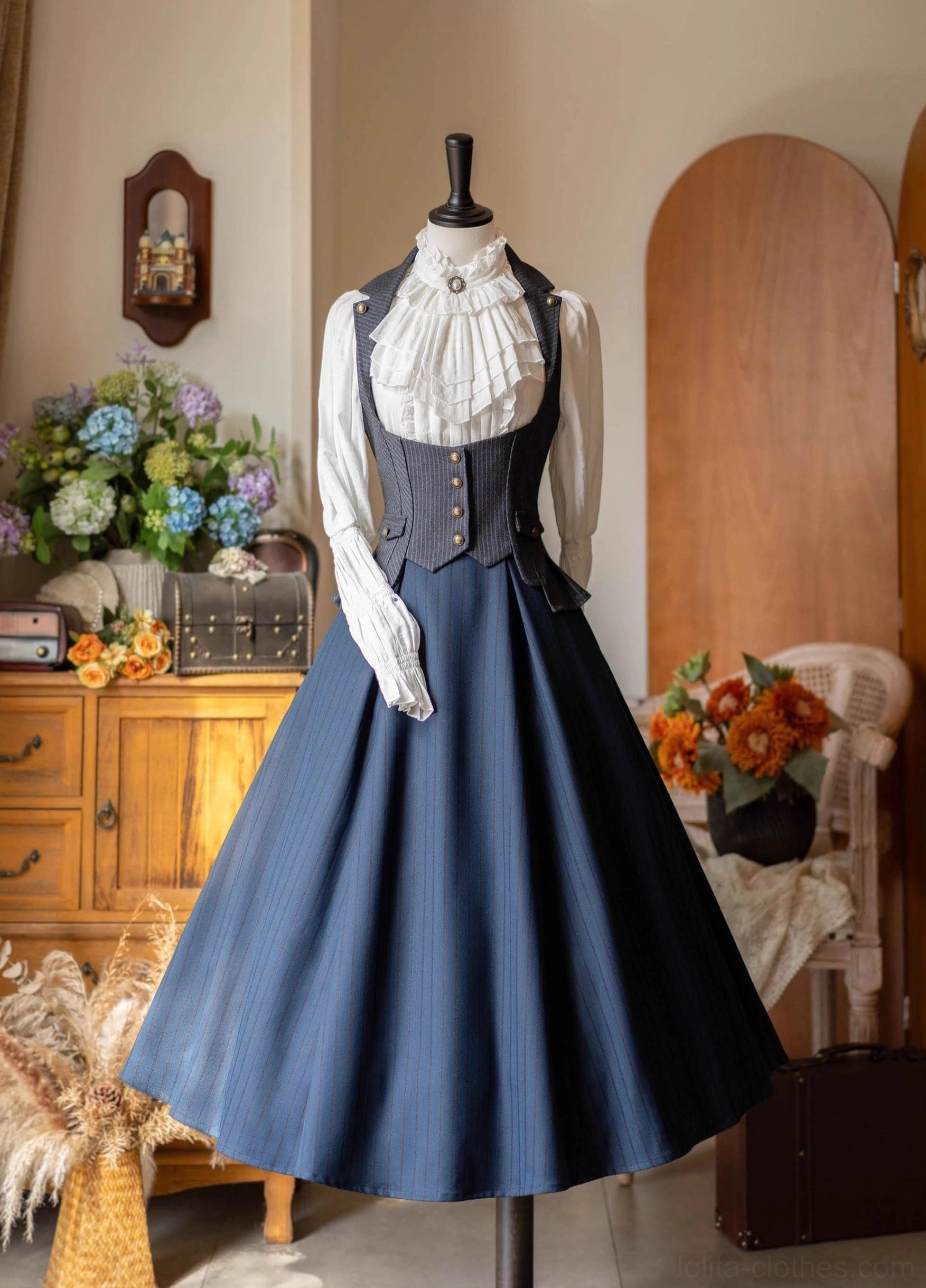 Complete classic lolita three-piece coordinate set with pinstriped waistcoat ruffled blouse and navy blue a-line midi skirt