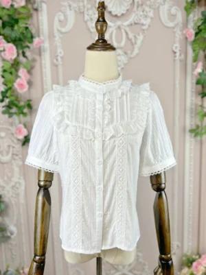 Lolita short sleeve cotton blouse with ruffle lace placket and button front closure on full body mannequin