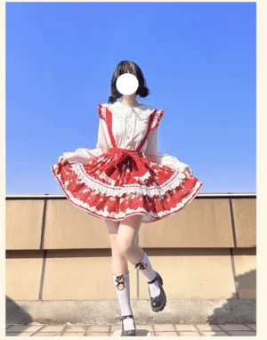 Full body lolita coordinate outfit featuring red printed ruffled skirt with white lace trim large waist bow red round handbag on outdoor rooftop