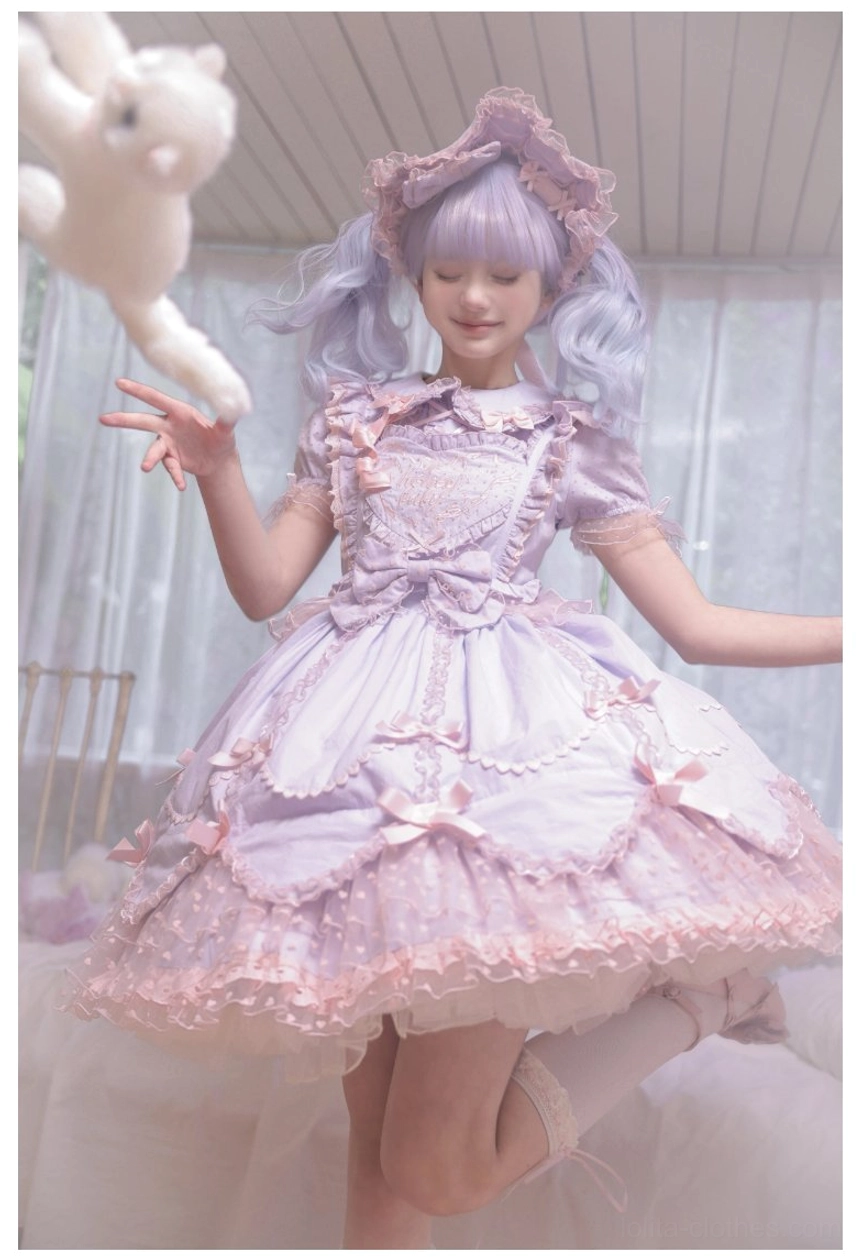 Sweet Lolita JSK dress set close-up showing petal-like hem construction embroidered tulle and satin ribbon trim details