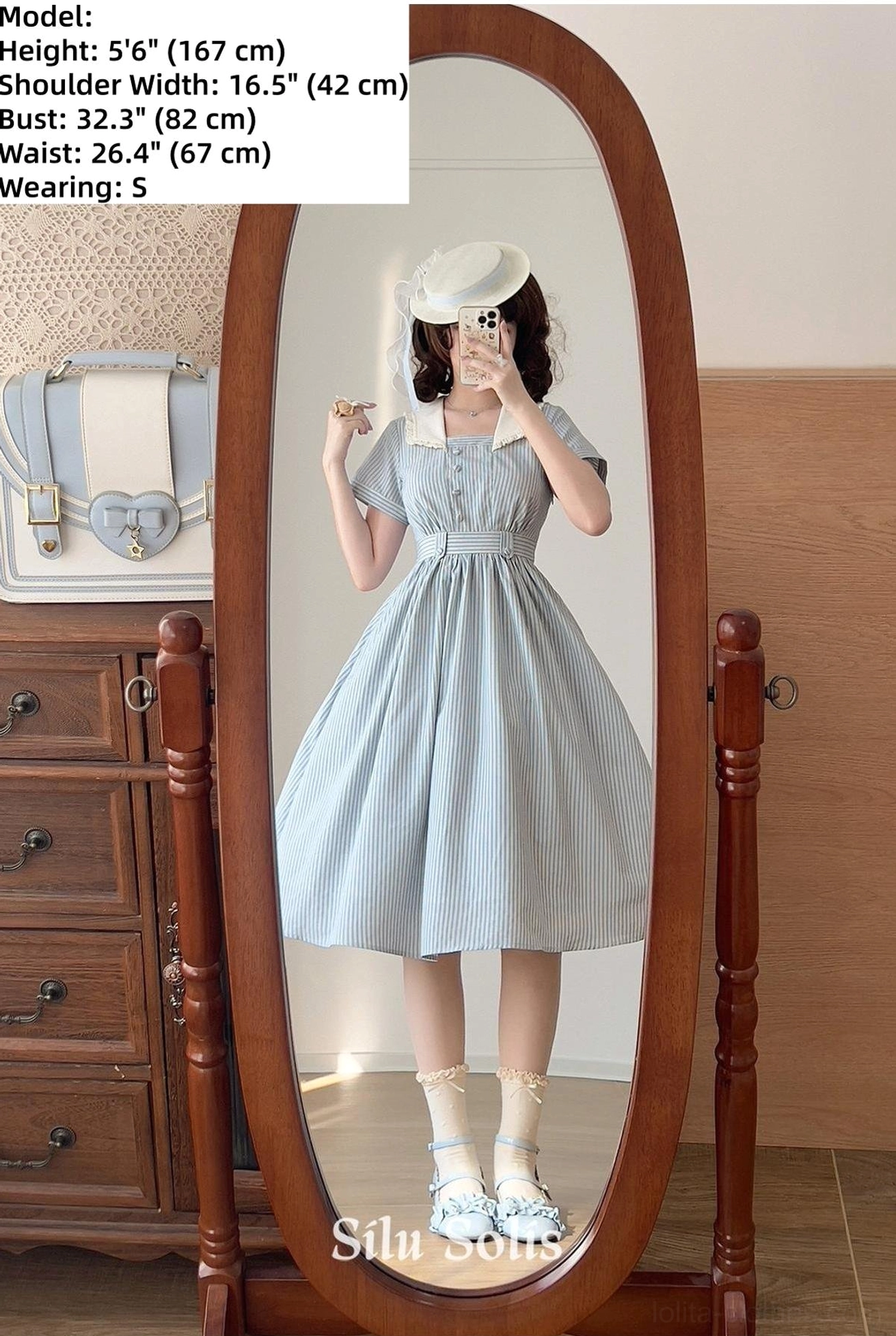 Puffed short sleeve detail close-up showing gathered cuff construction and delicate fabric texture of blue or pink striped Lolita dress sleeve design
