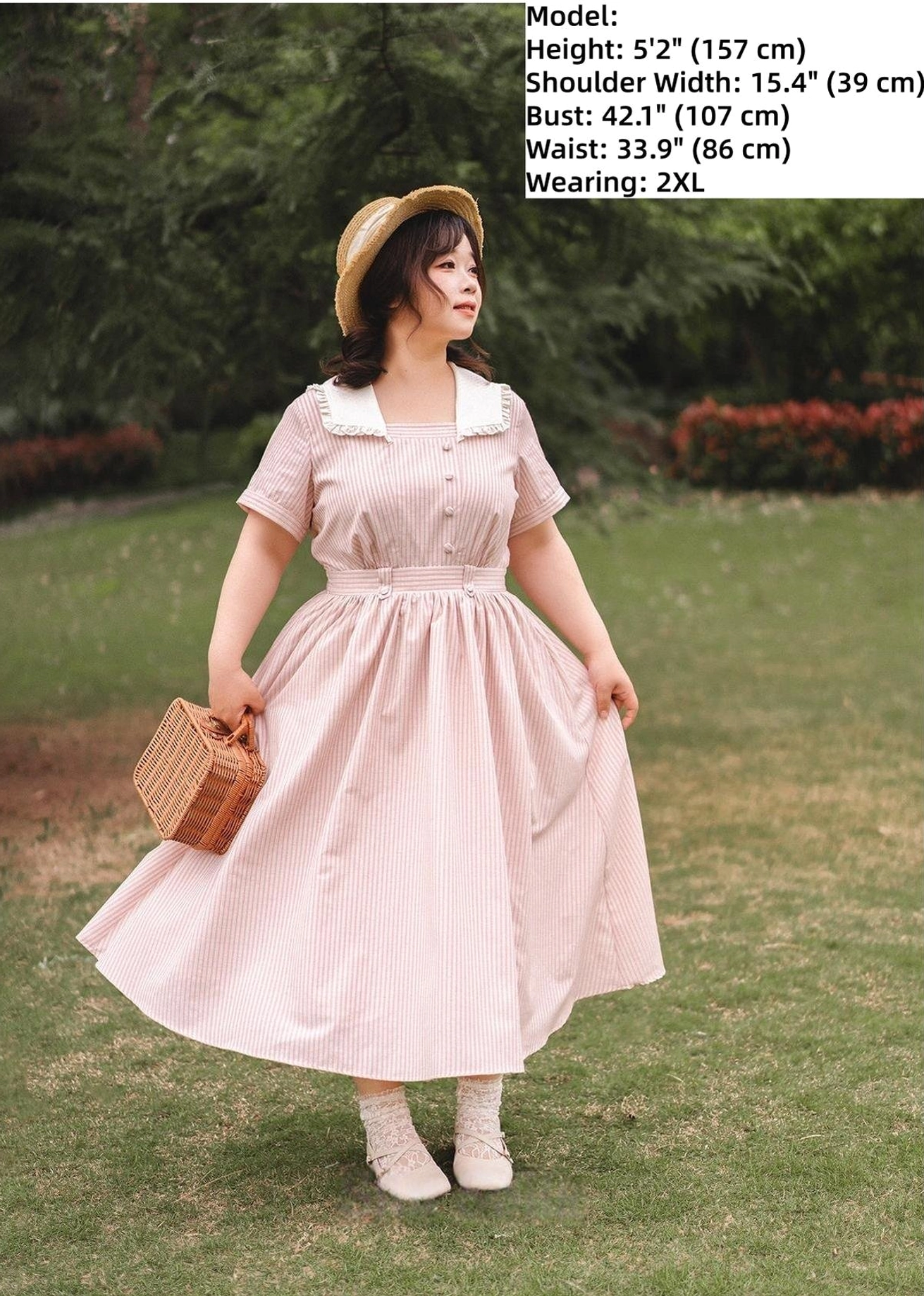 Detail shot of the dress waistband, elastic waist construction, and side pocket placement on striped classic Lolita OP dress for fit and functionality
