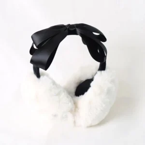 Winter lolita earmuff headdress flat lay product display, all-black satin bow design, white fluffy ear cups with black inner padding, standalone shot