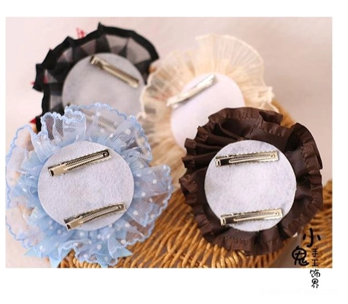 Lolita fashion culture and history context highlighting whimsical dessert-themed accessories as wearable art for self-expression in Lolita subculture