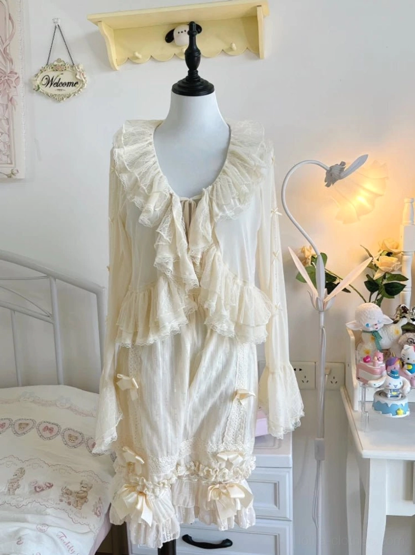 Lolita fashion styling guide featuring tulle bolero cardigan layered with JSK dress, tea party bonnet, and accessories for complete authentic coordinate