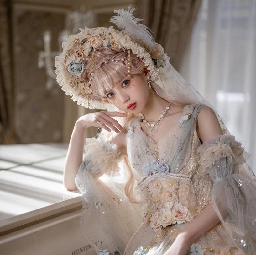 Lolita floral bonnet hat and pearl necklace elegant tea party styling combination with vintage Victorian aesthetic