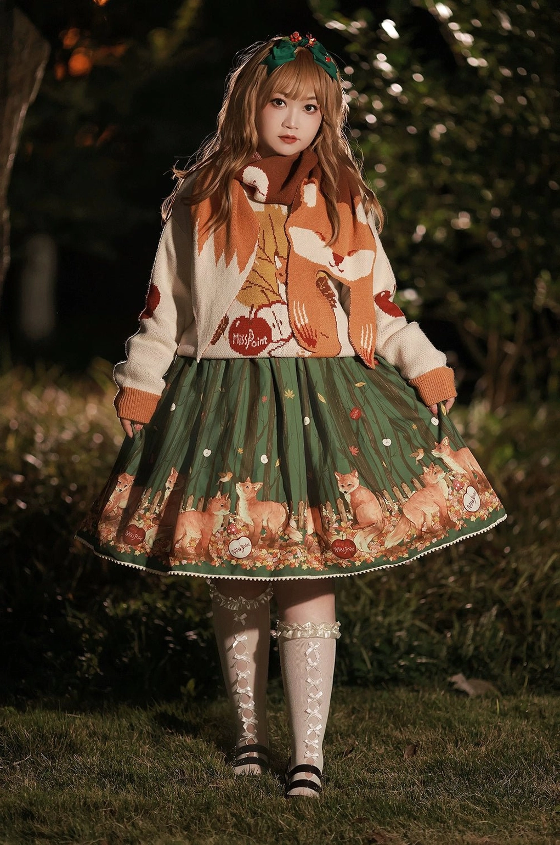 Lolita fox scarf draped styling showing full length 200cm woodland design apple motif repeating pattern texture detail